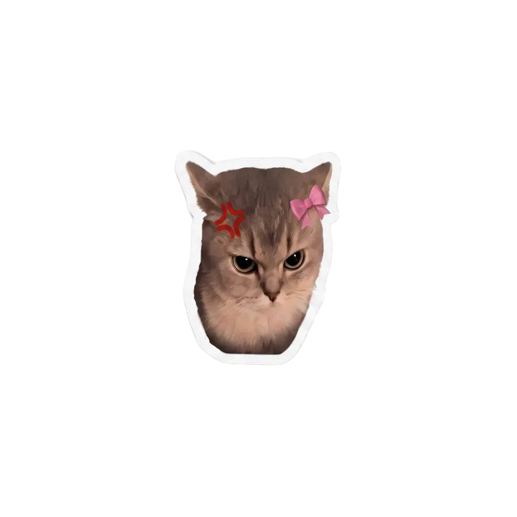 A die-cut sticker featuring a close-up photo of an angry gray tabby cat with a red star and a pink bow on its ears, shown on a plain white background.