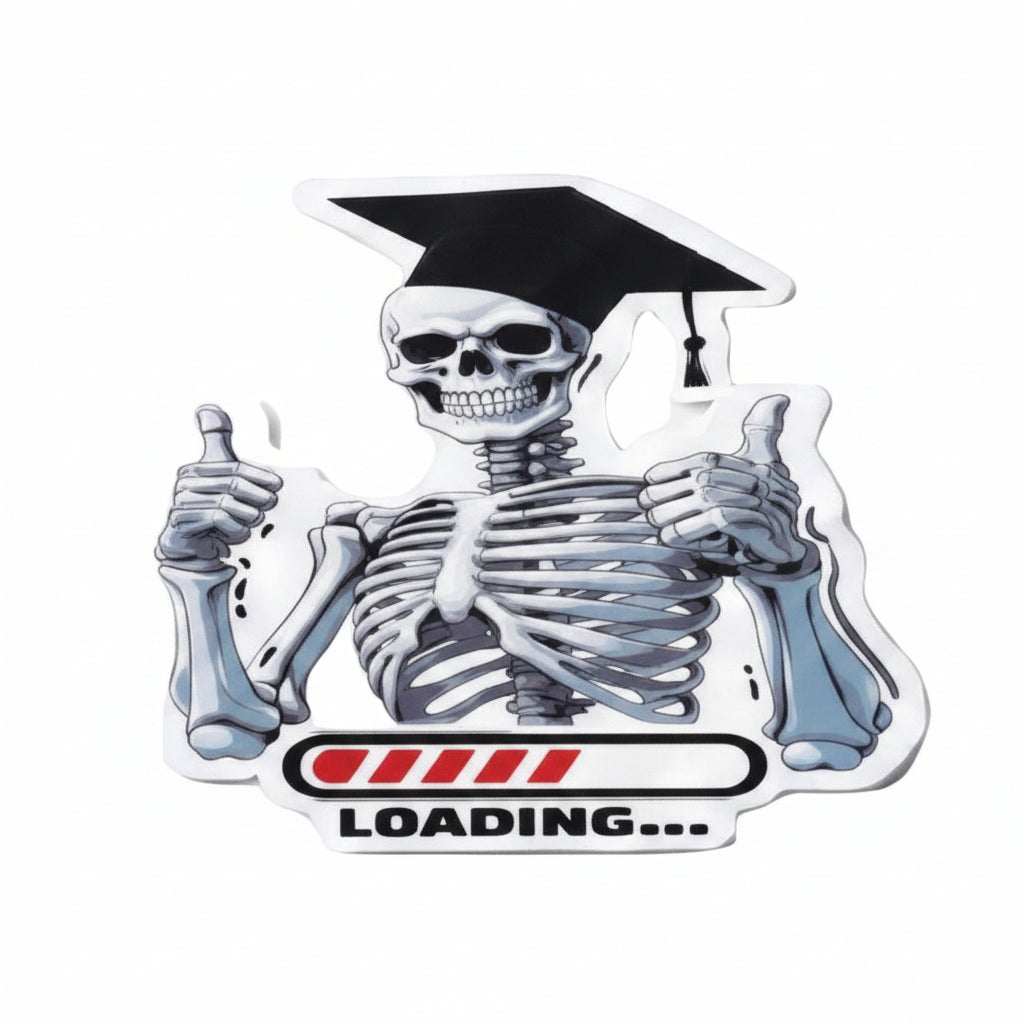 A die-cut sticker featuring a cartoon skeleton wearing a black graduation cap and giving two thumbs up, with a progress bar and the word 'LOADING.